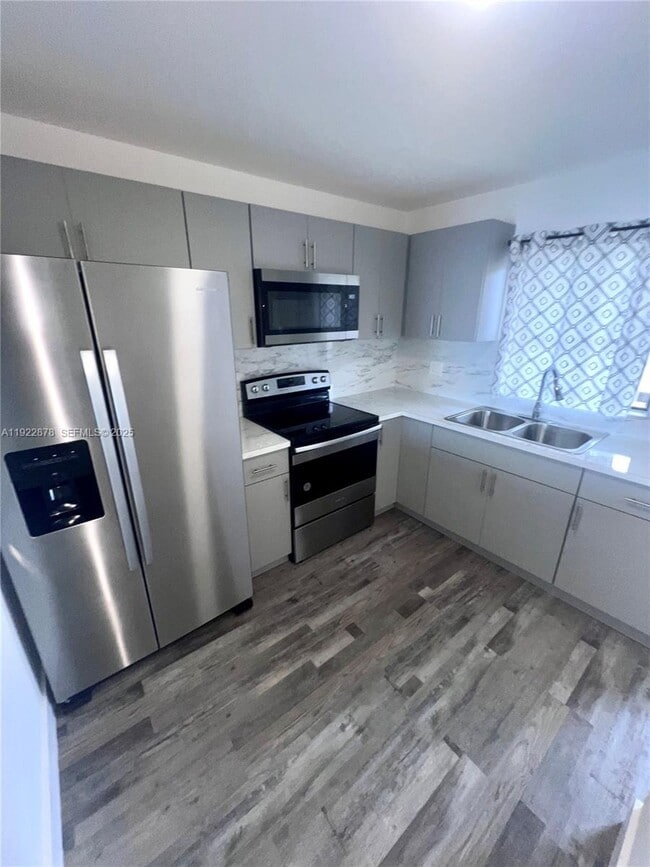 Building Photo - 6715 W 26th Dr