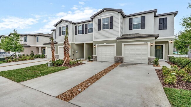 Foto del edificio - Gorgeous Brand New 3/2.5 Townhouse