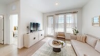 Located at 1700 Ranch Road in Nokomis, Florida, this one-bedroom, one-bathroom residence offers a thoughtfully designed single-floor layout filled with natural light and contemporary finishes. The open-concept living area seamlessly connects the kitchen, dining, and living spaces, creating an inviting and functional hub. The kitchen is well-appointed with white shaker cabinetry, granite countertops, stainless steel appliances including a range, microwave, dishwasher, and refrigerator, and a peninsula with bar seating illuminated by sleek pendant lighting. Light wood-style flooring flows throughout the main living areas, complementing the bright, neutral color palette. The living room features large windows that flood the space with natural light and provide outdoor views. The bedroom offers a comfortable retreat with plush carpet, dual windows, a ceiling fan, and direct access to a spacious walk-in closet with wire shelving. The bathroom includes a granite-topped vanity, a large mirror, and a separate walk-in closet entry. Additional highlights include a private balcony, a dedicated laundry area, and two closets for ample storage. The overall ambiance is clean, modern, and airy — ideal for comfortable Florida living.
