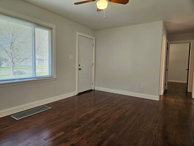 Building Photo - 1217 W 63rd Ave