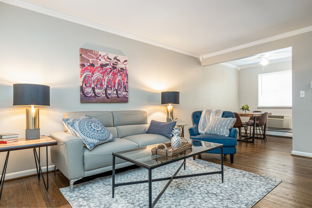 Sala de estar con muebles Mildon - Mildon Apartments