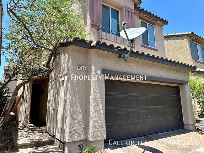 Building Photo - Two-Story with Open High-Ceiling Living Ro...