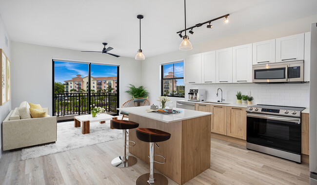 Your new home features spacious kitchens with brand-new stainless steel appliances. - The Reserve at Coconut Point