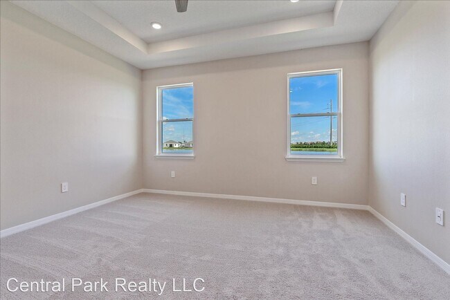 Building Photo - 4 br, 2.5 bath House - 5740 Woodland Sage ...