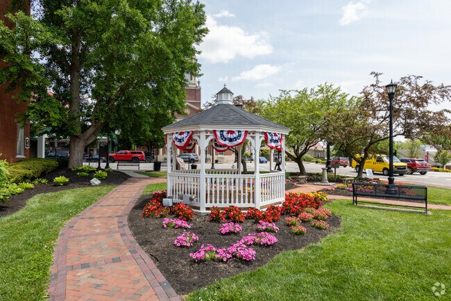 Gazebo Park adorned with summer flowers in Lebanon.