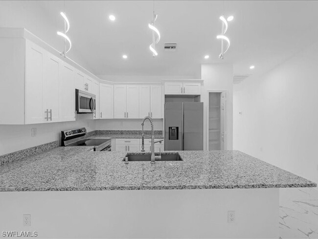 Building Photo - 4549 Leonard Blvd S
