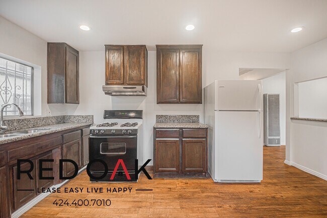 Building Photo - 1309 W 36th Pl