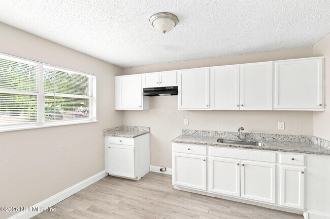 Building Photo - 6813 Tinkerbell Ln