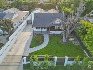 Building Photo - 5937 Ranchito Ave