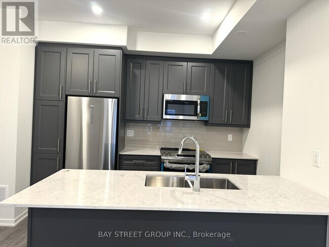 Photo du bâtiment - 130 Honeycrisp Cres