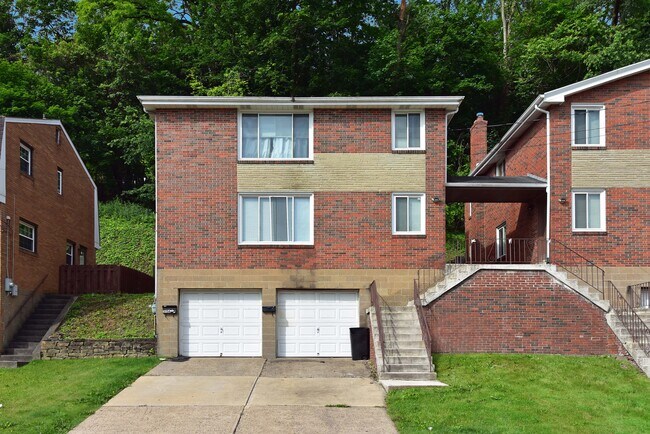 Available unit is on first floor above the garage. - 3156 Glendale Ave