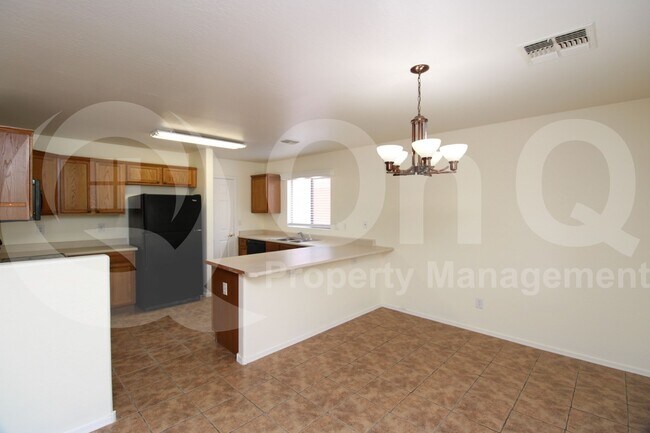 Building Photo - 43902 W Magnolia Rd