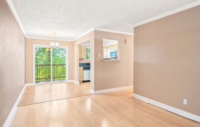 Building Photo - Spacious 2-Bedroom Condo with Forest Views, Private Balcony, In-Unit Laundry & Community Amenitie...