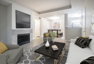 Living Room with Fireplace - Wyndham Apartments