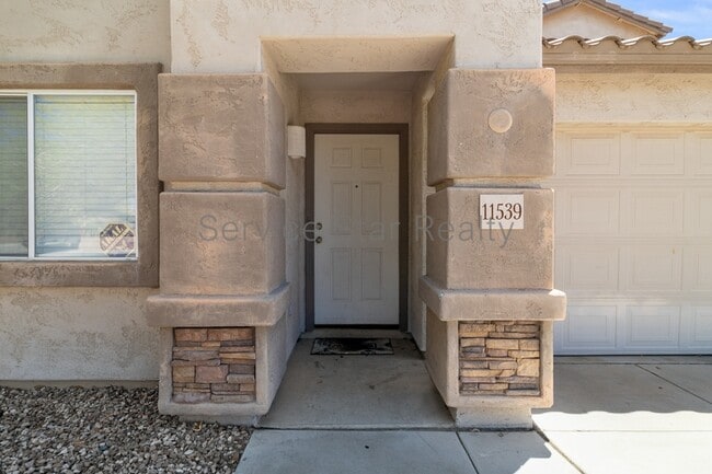 Foto del edificio - 11539 W Longley Ln