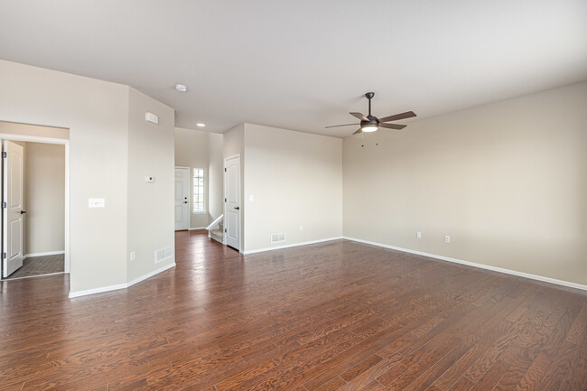 Living room with 1/2 bath to the left (background) & entry (right background) - 10504 18th St