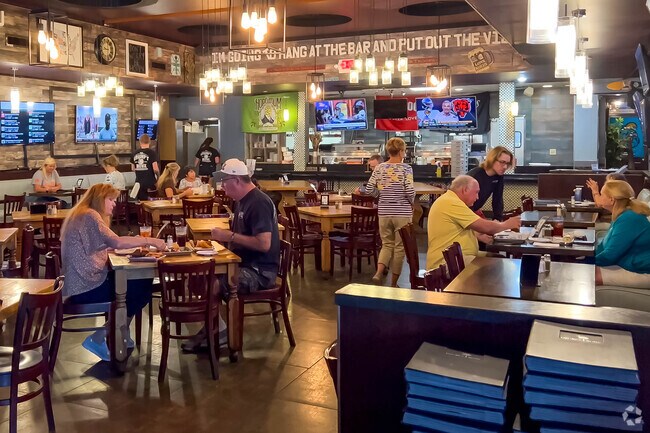 There is indoor and outdoor seating at the Grumpy Monkey in Plantation Lakes.