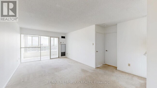 Photo du bâtiment - 75 King St E