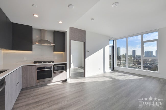 Photo du bâtiment - Stunning 2 Bedroom 2 Bathroom Condo at The Grand with Wraparound Deck Views and Concierge Living