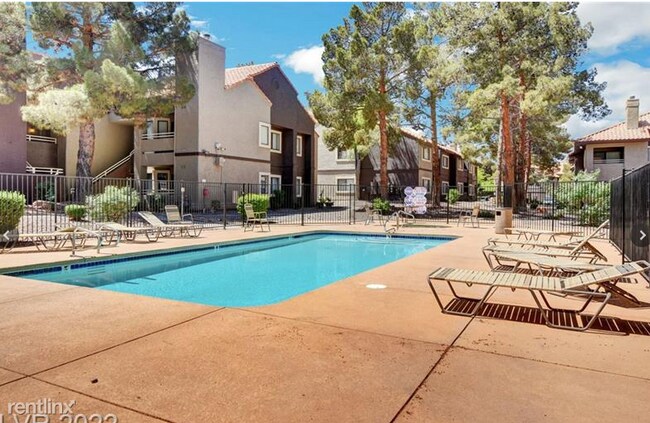 Building Photo - 2 br, 1 bath Condo - 5004 S Rainbow Blvd 1...