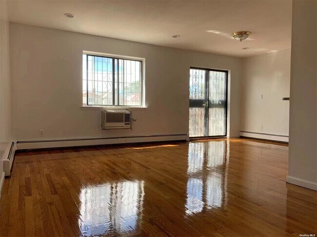 Building Photo - 134-21-134-58 58th Ave