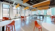 Located on Mulberry Street in Westlake, Ohio, this single-floor commercial space is a thoughtfully designed environment that blends collaborative workspaces with recreational amenities. The layout spans a generous open footprint, revealed clearly through its 3D scan, accommodating multiple distinct zones that encourage both productivity and leisure.

The kitchen area features polished concrete floors, a large stainless steel island with bar seating, full-size appliances, lime-green cabinetry, and a striking patterned ceiling with pendant lighting. Warm wood wall cladding adds texture throughout this zone.

Adjacent lounge areas include a sleek, double-sided steel fireplace as a central focal point, surrounded by eclectic seating on colorful geometric-patterned rugs. Natural light pours in through floor-to-ceiling windows. A communal table zone features wood-toned surfaces, oversized pendant lights, built-in storage, and a wall-mounted display screen.

The recreation area is bright and open, with polished concrete floors, exposed ductwork ceilings, and perforated acoustic panels. It accommodates ping-pong, foosball, shuffleboard, and casual seating. A cozy nook with a hanging chair, cornhole board, and cushioned bench seating completes the space, creating an engaging, well-rounded environment.