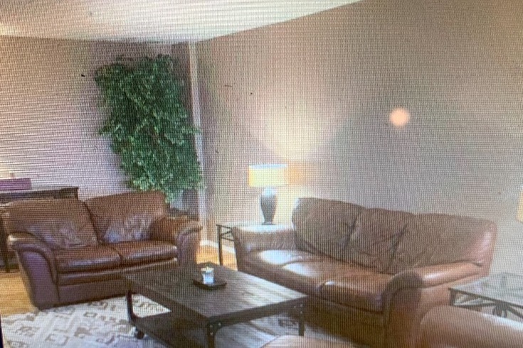 large living room with sliders to balcony - 28 Riverside Ave