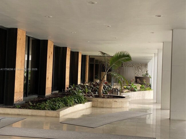 Building Photo - 5555 Collins Ave