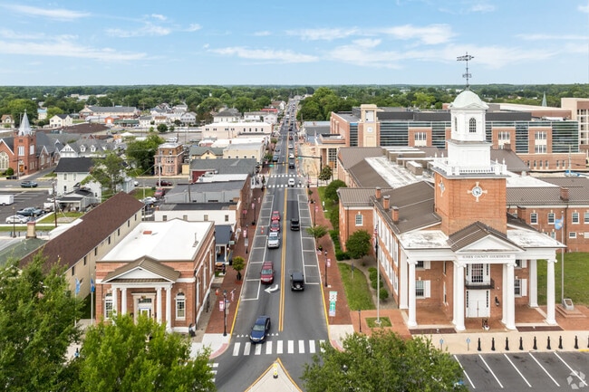 Historic and modern buildings line Market Street in Georgetown.
