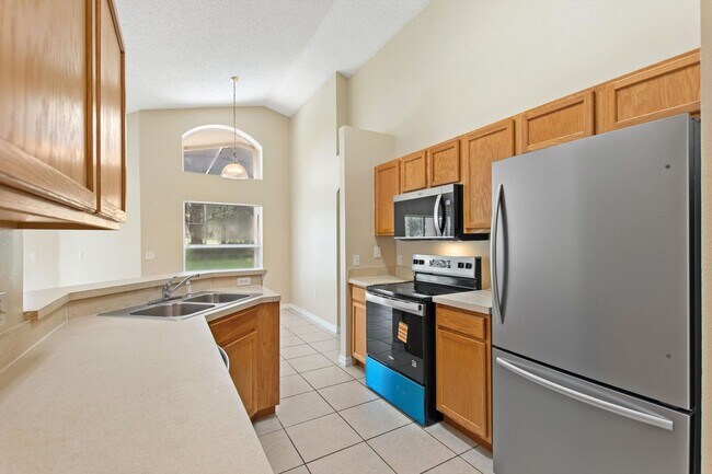 Building Photo - Grand Lagoon 4 Bed 2 Bath Model Located in the Five-Star Southern Dunes Golf and Country Club Com...