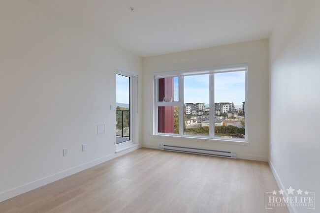 Building Photo - Modern 2-Bedroom Condo at The District at ...