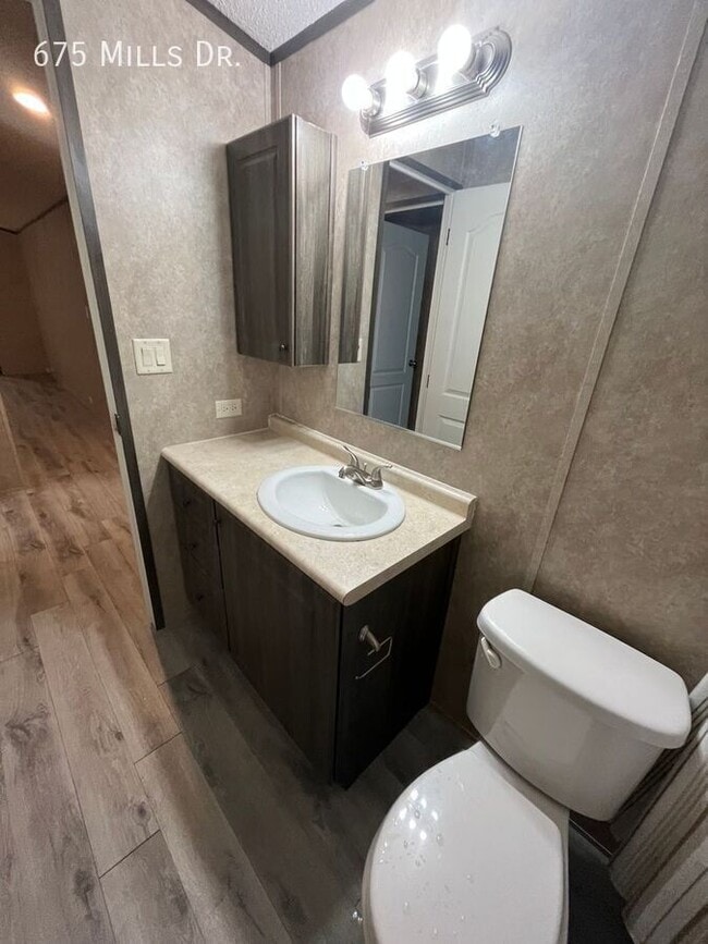 Building Photo - 675 E Mls Dr
