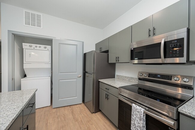 Large Kitchen with in Home W/D - The Retreat at Canal Apartments