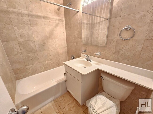 Building Photo - Bright 1-Bedroom in Midtown East | 7th Flo...