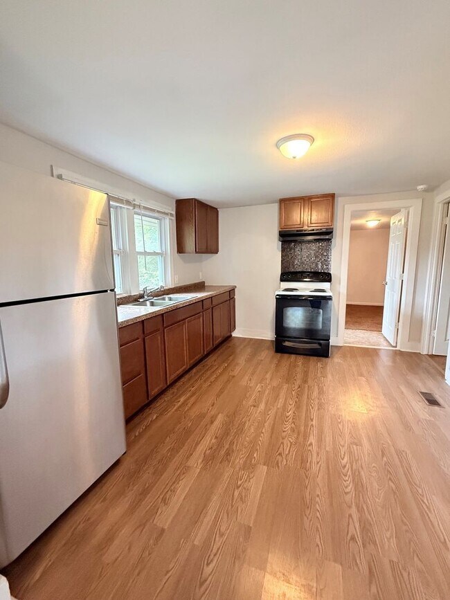 Building Photo - Now Available! Spacious 3 Bedroom on a Corner Lot