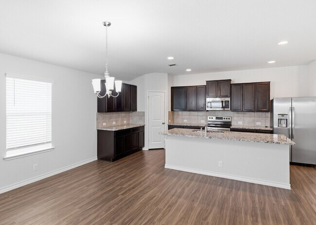 Building Photo - Spacious 4 Bedroom Home with Covered Patio in Red River Ranch