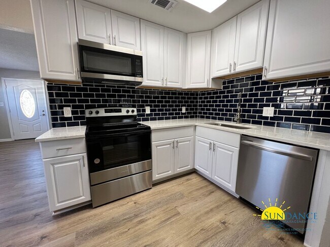 Building Photo - Welcome to this newly renovated 4 bedroom ...