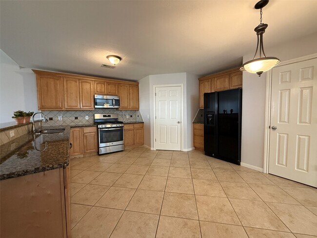 Foto del edificio - 5935 Wildbriar Ln