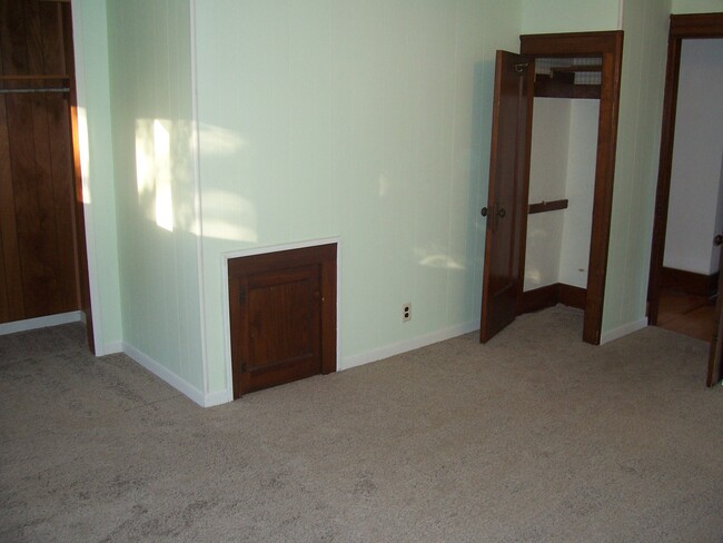 The second bedroom has two closets and the access to the tub plumbing. - 850 SOUTH 17TH STREET