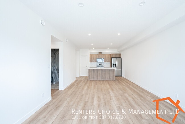 Building Photo - NEW 2 BEDROOM MAIN FLOOR UNIT WITH ASSIGNE...