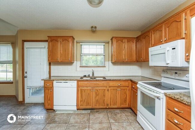Building Photo - 1713 NE Stonewood Dr