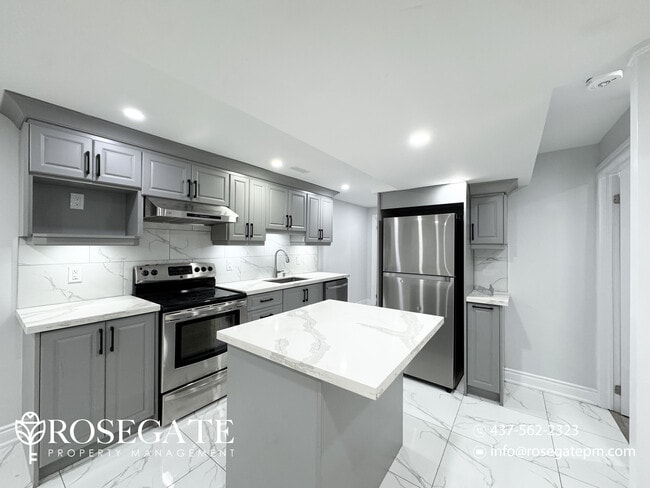 Building Photo - Modern 2-Bedroom Basement Apartment with H...