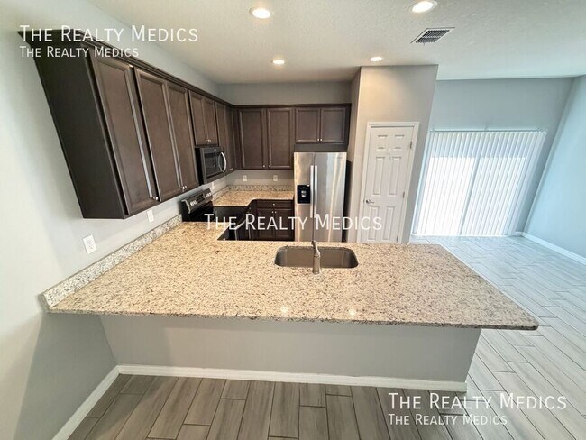 Foto del edificio - 491 Ixora Ave NW