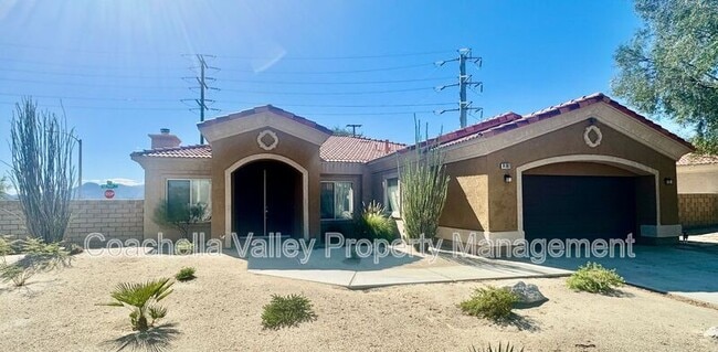 Building Photo - 74091 Daisy Ln