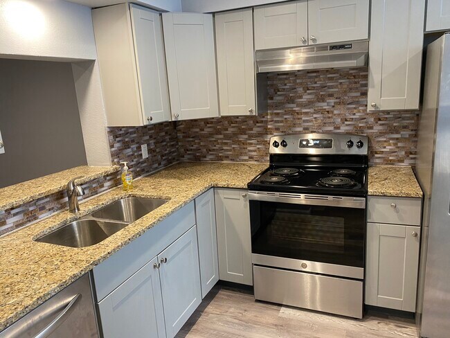 Brand new Granite Countertops & Cabinetry. - 15613 Weldon Dr
