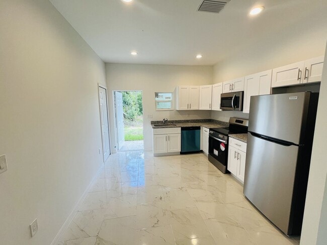 Building Photo - BRAND NEW 2/2/1-EAST LEHIGH ACRES