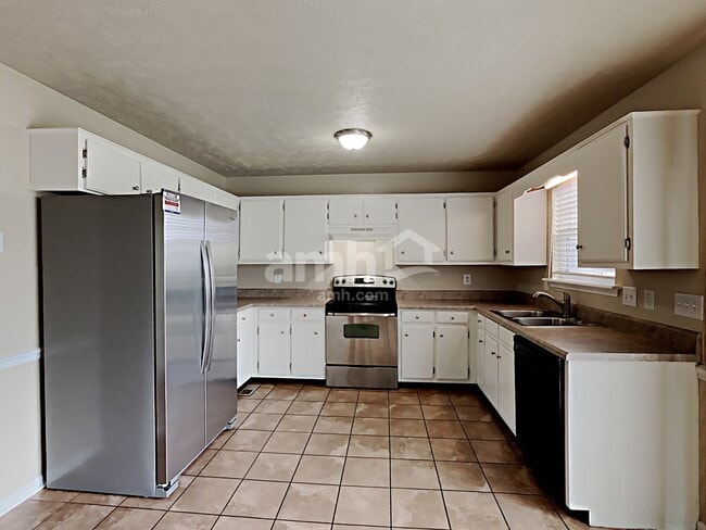 Foto del edificio - 403 Wooded Valley Ct