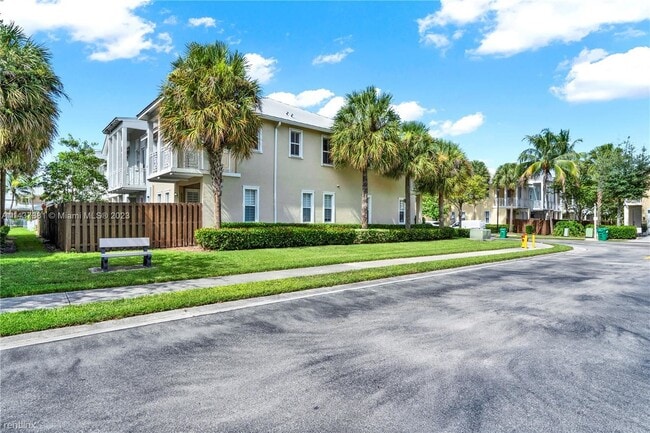 Building Photo - 4 br, 3.5 bath Townhome - 7500 NW 107th Pl
