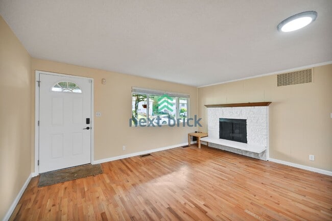 Photo - Charming 4-Bed Oasis in Renton with 2 Full Baths House