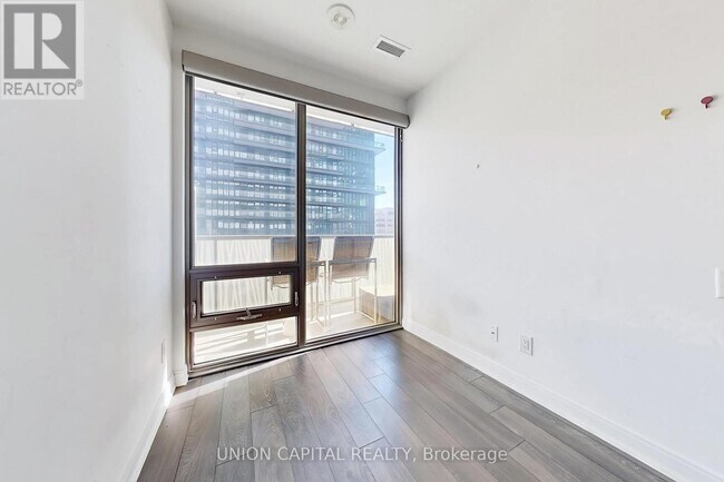 Building Photo - 50 Charles St E